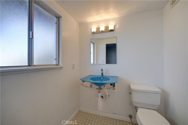 bathroom with sink and toilet