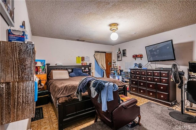 bedroom with a textured ceiling