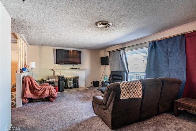 living room featuring a textured ceiling, a brick fireplace, and carpet floors