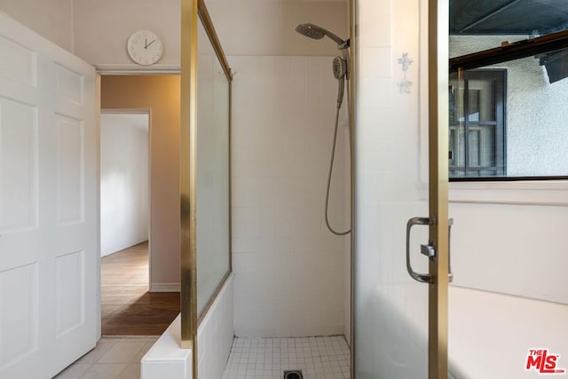 bathroom featuring walk in shower