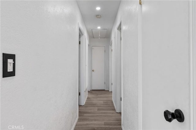 hallway with light wood-type flooring