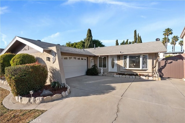 ranch-style home with a garage