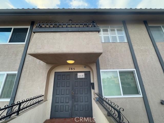 785 W 19th St Unit 12B, San Pedro, CA 90731 - property entrance with stucco siding