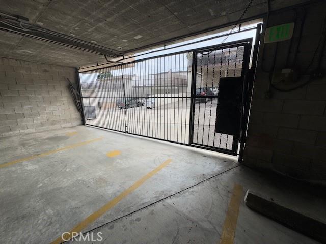 785 W 19th St Unit 12B, San Pedro, CA 90731 - parking garage featuring concrete block wall