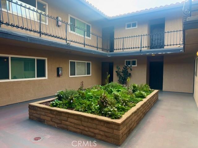 785 W 19th St Unit 12B, San Pedro, CA 90731 - exterior space with stucco siding and a balcony
