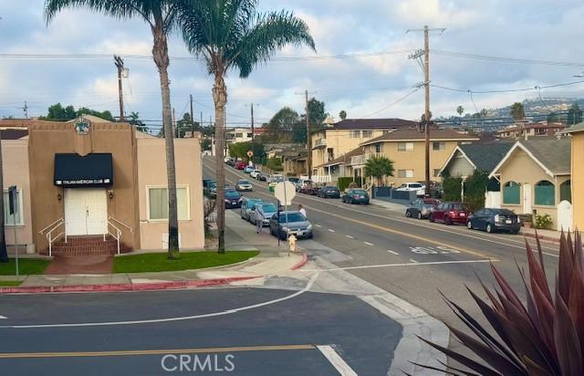 785 W 19th St Unit 12B, San Pedro, CA 90731 - view of asphalt street with sidewalks, curbs, and a residential view