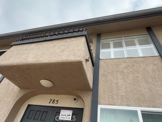 exterior details with stucco siding