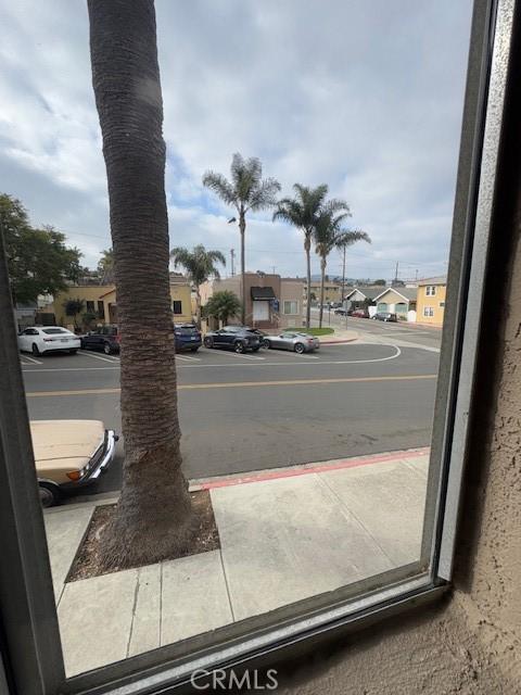 785 W 19th St Unit 12B, San Pedro, CA 90731 - view of asphalt street with sidewalks, a residential view, and curbs