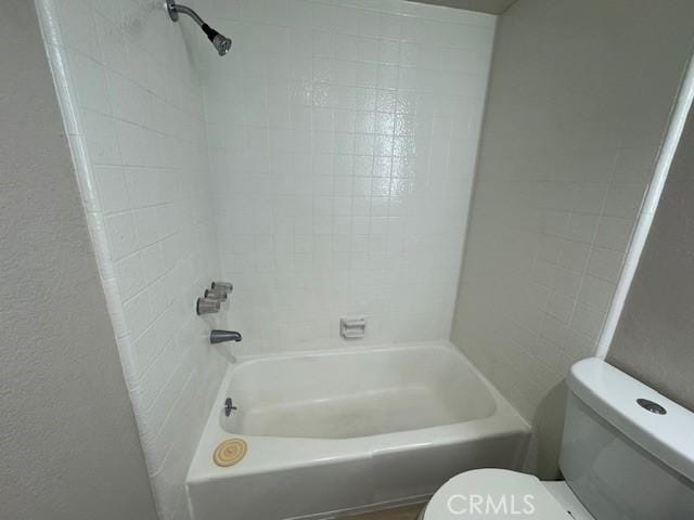 full bathroom with  shower combination and toilet