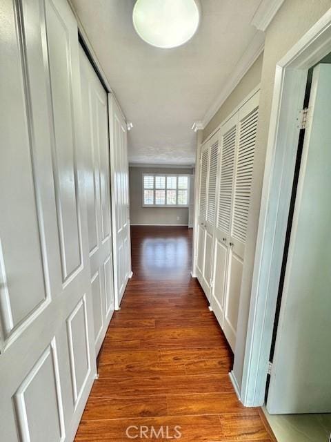 785 W 19th St Unit 12B, San Pedro, CA 90731 - corridor with crown molding and wood finished floors