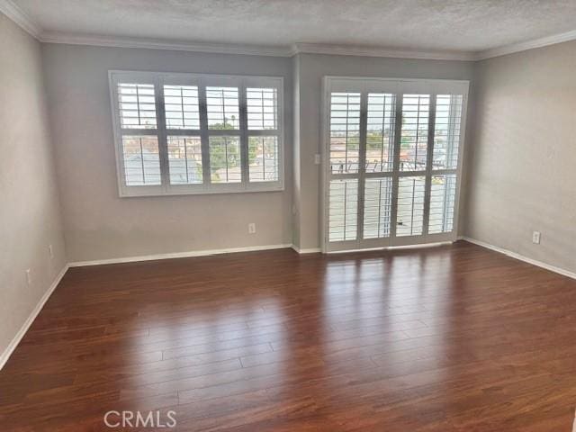 785 W 19th St Unit 12B, San Pedro, CA 90731 - unfurnished room with wood finished floors, crown molding, and a textured ceiling