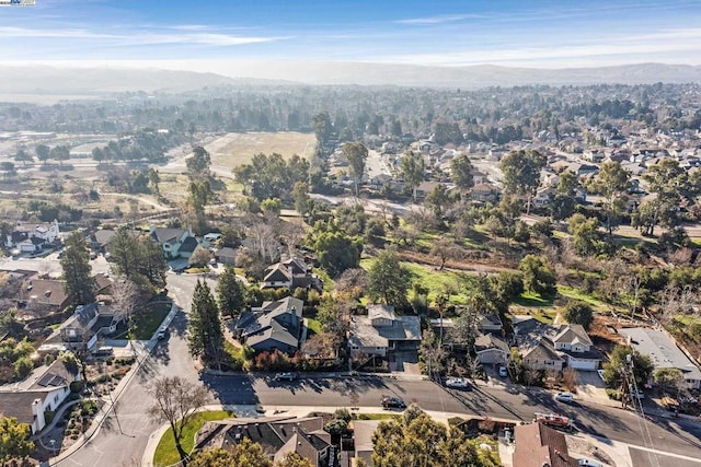 drone / aerial view featuring a mountain view