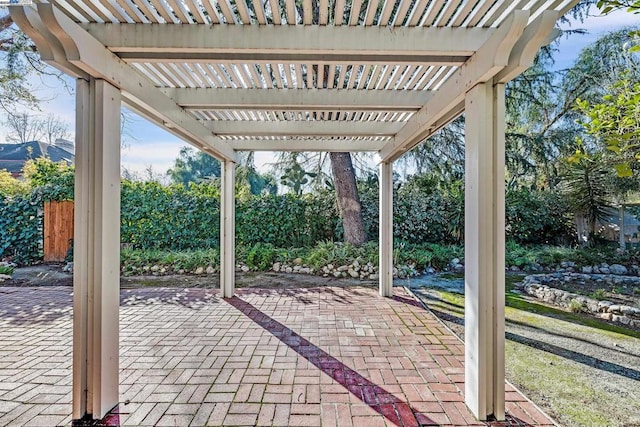 view of patio featuring a pergola