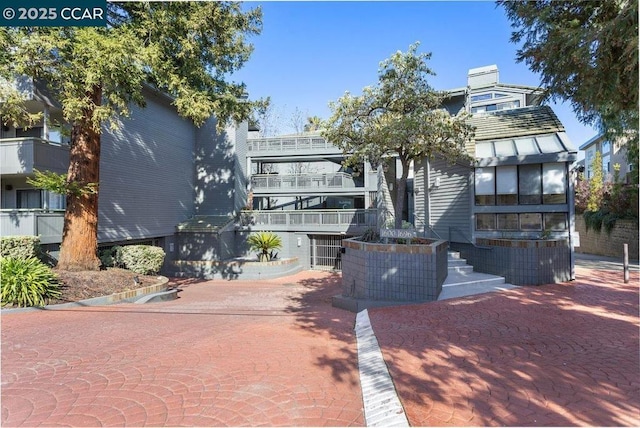 view of front of property featuring central AC unit