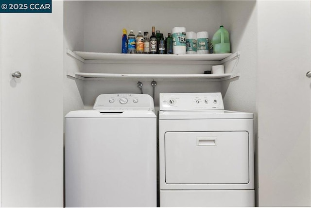 laundry area with separate washer and dryer