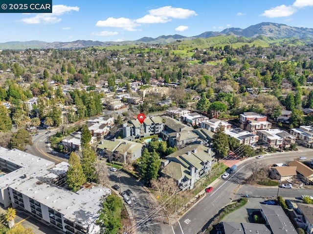 drone / aerial view featuring a mountain view