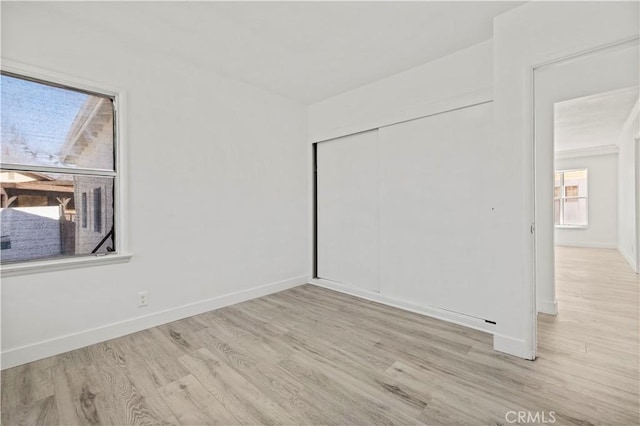 empty room featuring light hardwood / wood-style floors