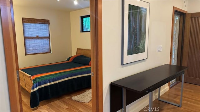 bedroom featuring hardwood / wood-style flooring