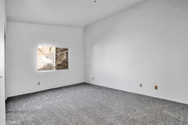 unfurnished room with carpet flooring