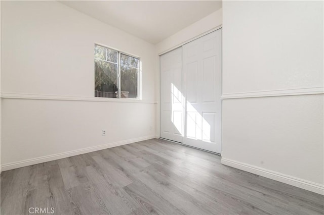 empty room featuring light hardwood / wood-style floors