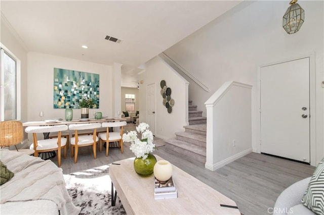 living room with light hardwood / wood-style floors