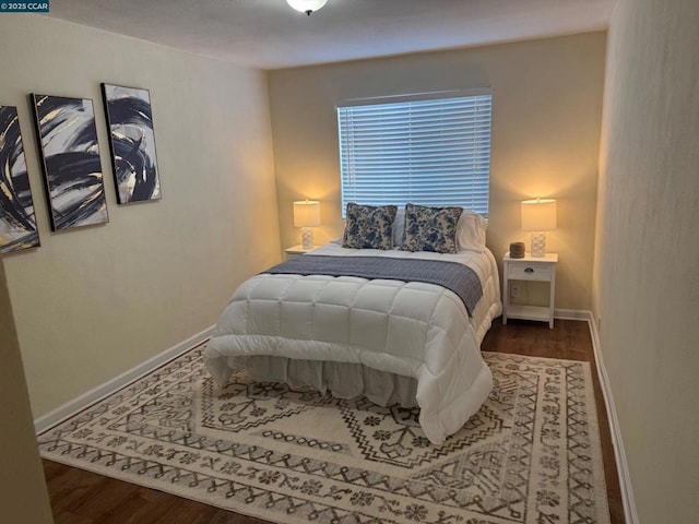 bedroom featuring wood-type flooring