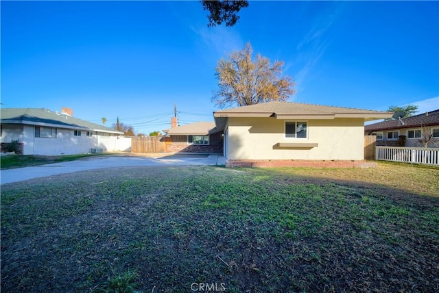 view of home's exterior featuring a lawn