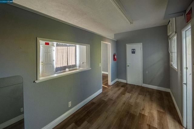 hallway featuring hardwood / wood-style flooring