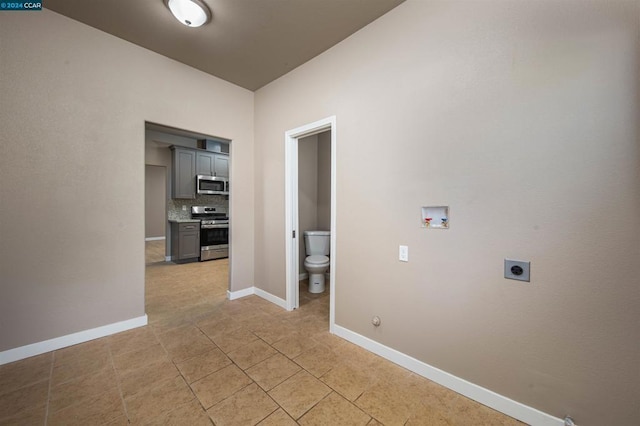 laundry area featuring washer hookup, gas dryer hookup, and hookup for an electric dryer