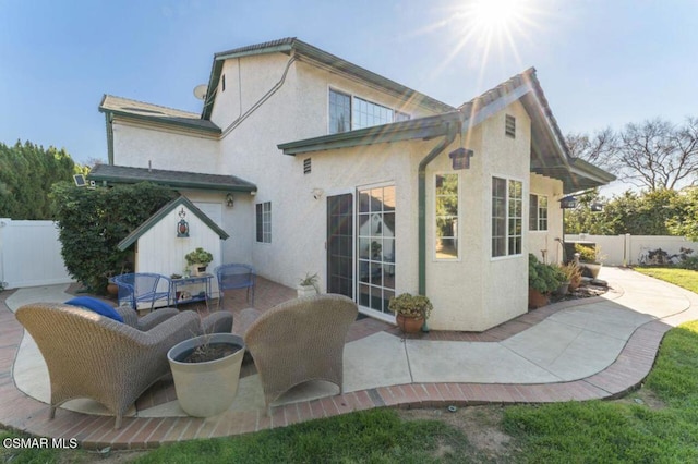 back of house featuring a patio