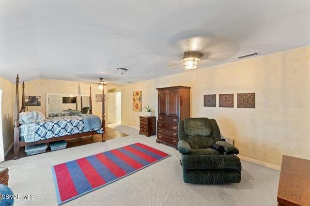 carpeted bedroom featuring ceiling fan and lofted ceiling