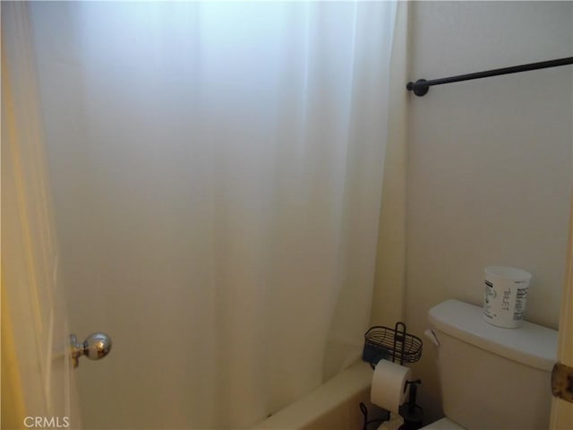 bathroom featuring toilet