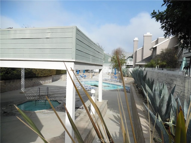 view of pool with a patio