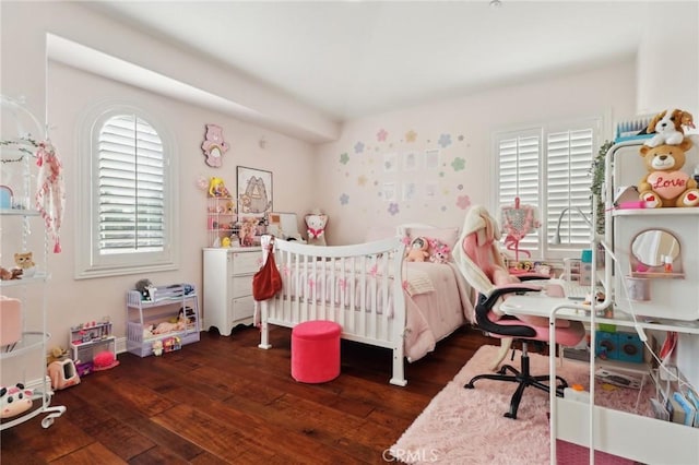 bedroom featuring wood-type flooring