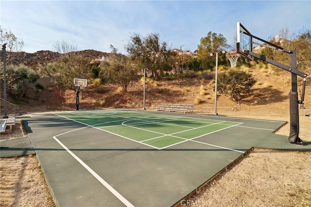 view of basketball court featuring community basketball court and a mountain view