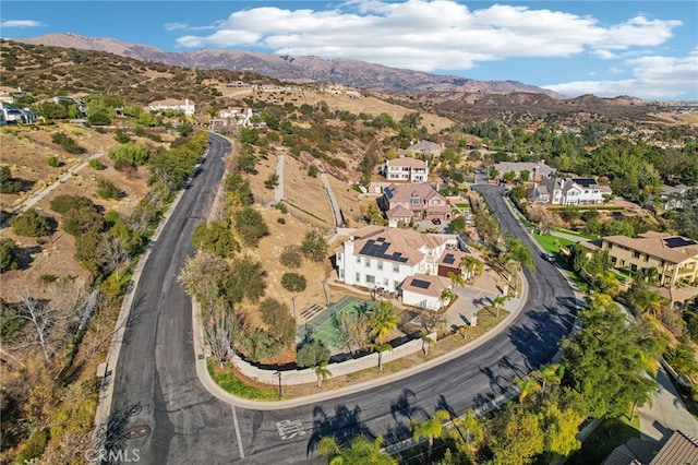 aerial view with a residential view and a mountain view