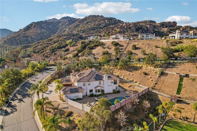 drone / aerial view featuring a mountain view