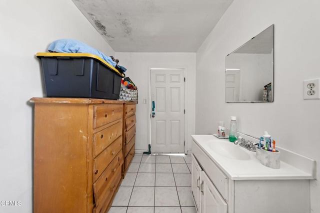 bathroom featuring vanity and tile patterned flooring