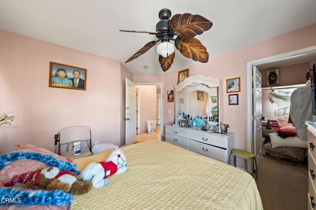 bedroom with ceiling fan and light carpet