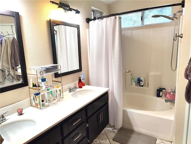 bathroom with vanity, tile patterned flooring, and shower / tub combo with curtain