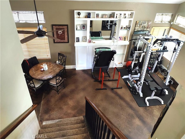 workout room with ceiling fan