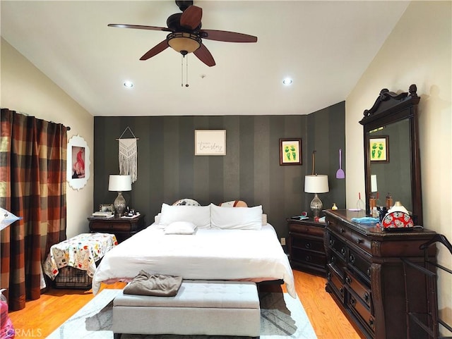 bedroom featuring ceiling fan and light wood-type flooring