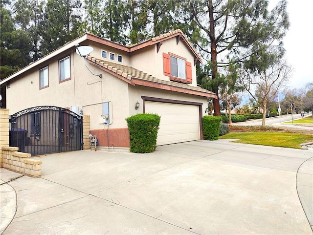 view of side of property featuring a garage