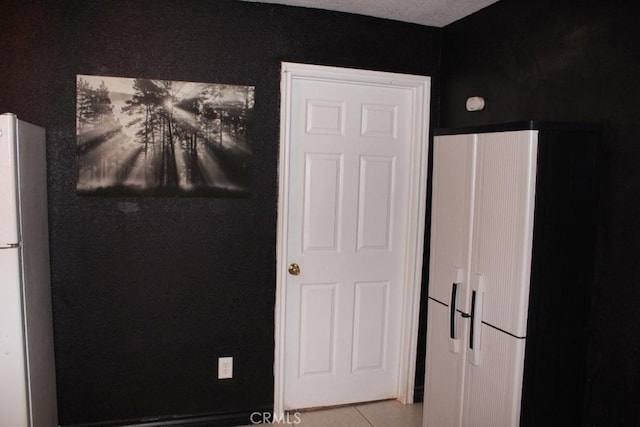 room details featuring white fridge