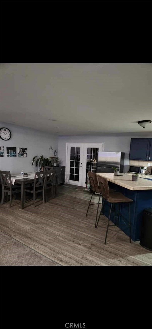 dining room featuring dark wood-type flooring