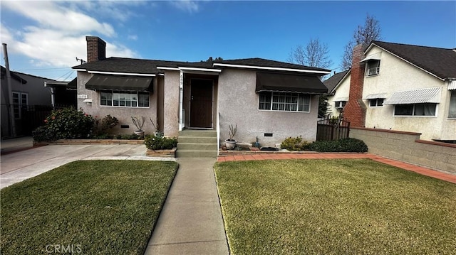 bungalow-style house featuring a front yard