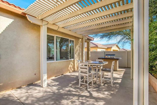 view of patio featuring a pergola