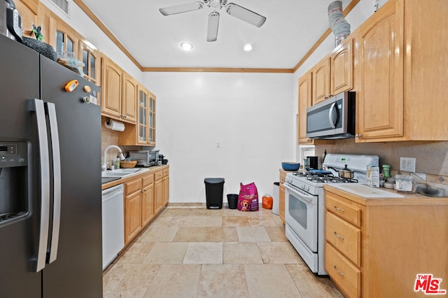 kitchen featuring ceiling fan, sink, crown molding, stainless steel appliances, and light brown cabinetry