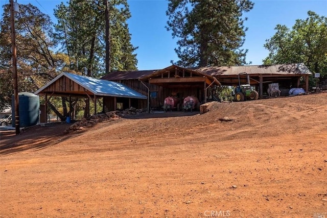 view of front facade with a carport