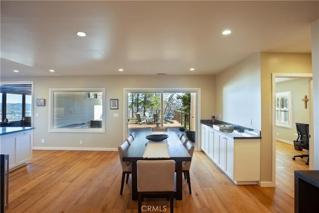 dining room with light wood-type flooring